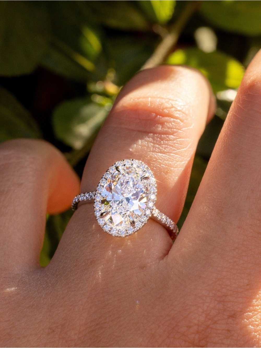 Oval Halo Solitaire Moissanite Engagement Ring in High Polished Sterling Silver